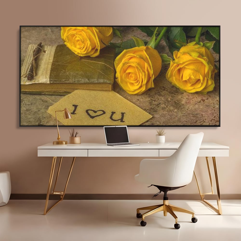Tablou canvas cu tablou canvas cu trandafiri galbeni si jurnal, in rama de aluminiu negru, pe perete intr-un birou